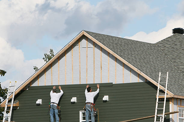 Professional Siding technician working in Volant, PA